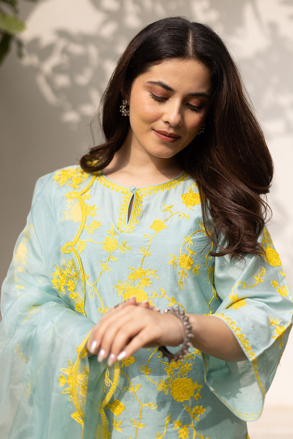 Mint chanderi yellow embroidered suit with matching organza dupatta