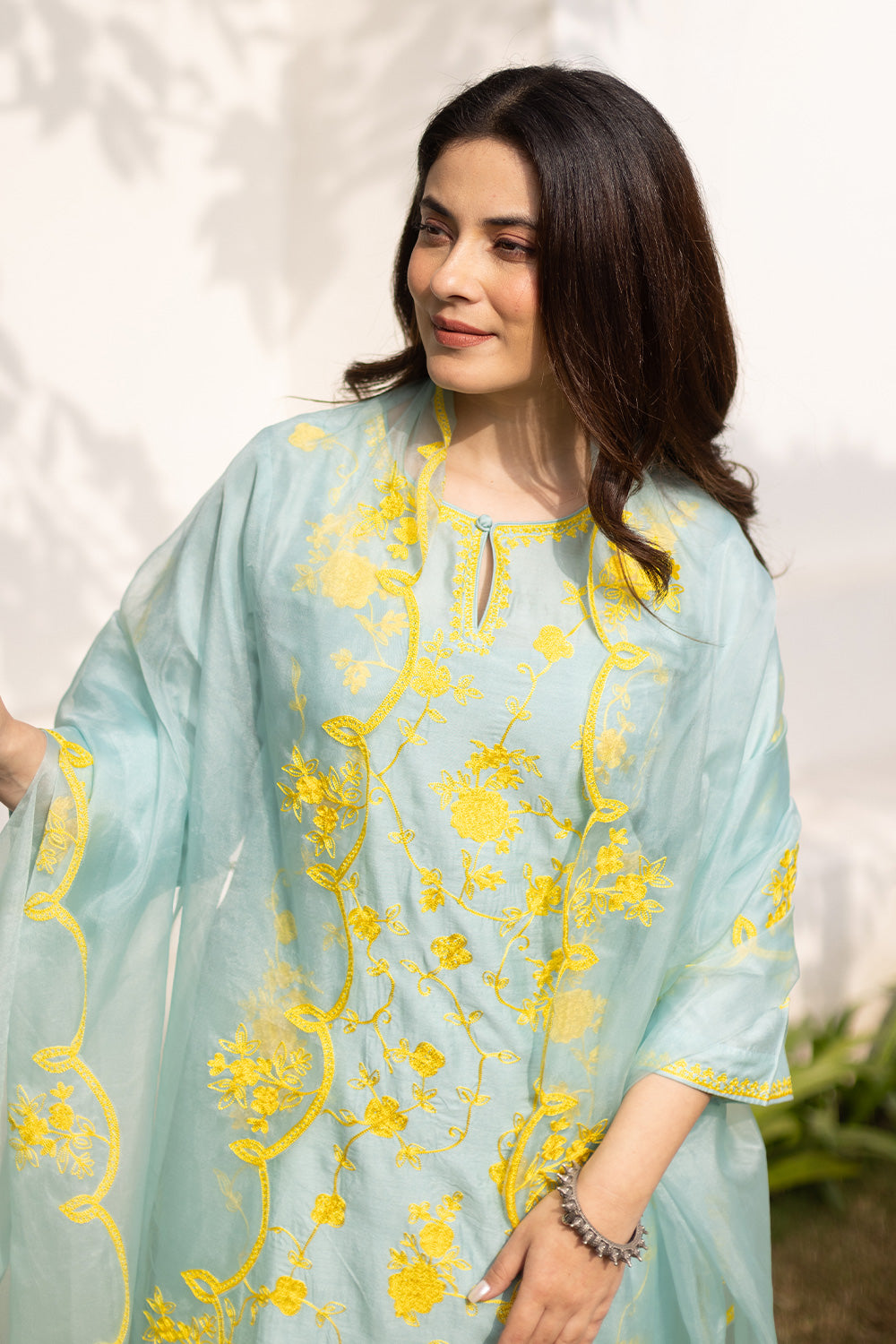Mint chanderi yellow embroidered suit with matching organza dupatta
