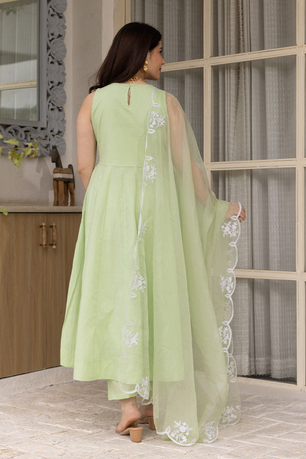 Pista cotton anarkali with an embroidered organza dupatta