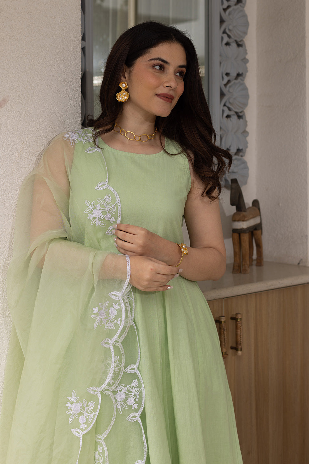 Pista cotton anarkali with an embroidered organza dupatta