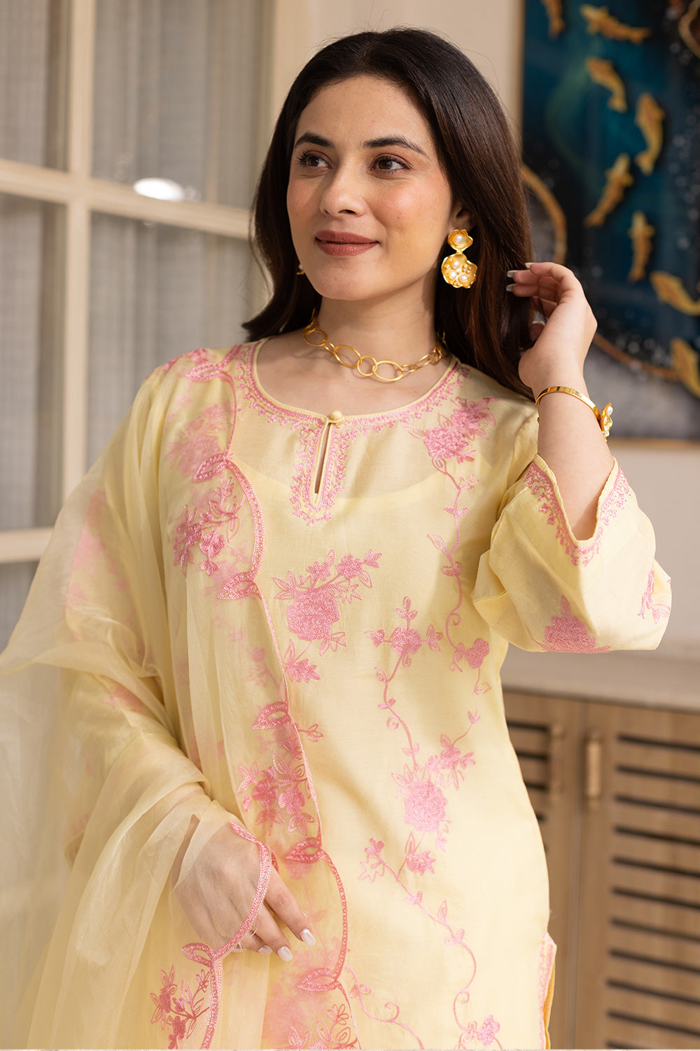 Yellow chanderi pink embroidered suit with matching organza dupatta